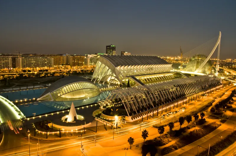 The City of Arts and Sciences illuminated at dusk